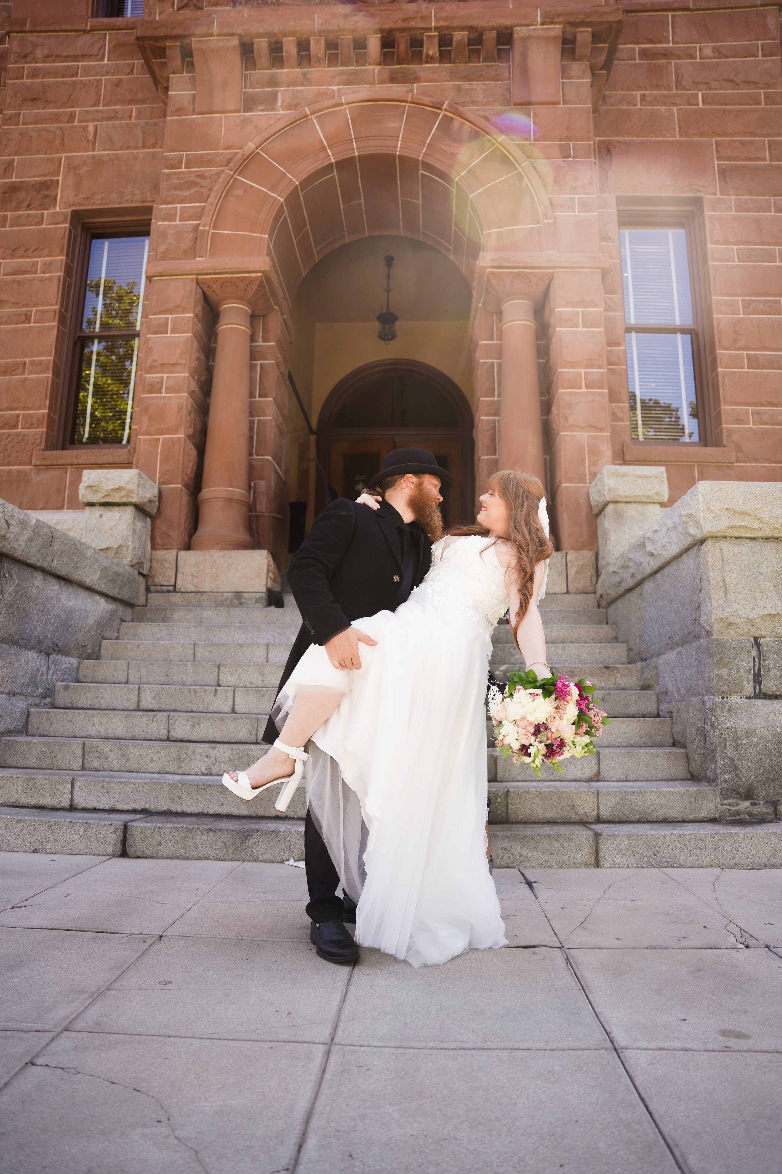 Beautiful, timeless moments captured of Joshua & Colleen at the historic OC Courthouse in Santa Ana. Civil courthouse wedding photography that tells your story—book us today.