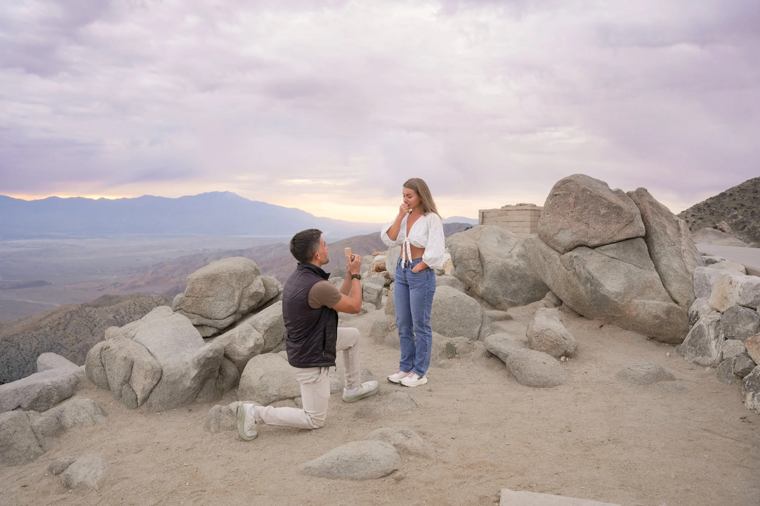 Surprise proposal captured at Keys View in Joshua Tree during sunset engagement moment