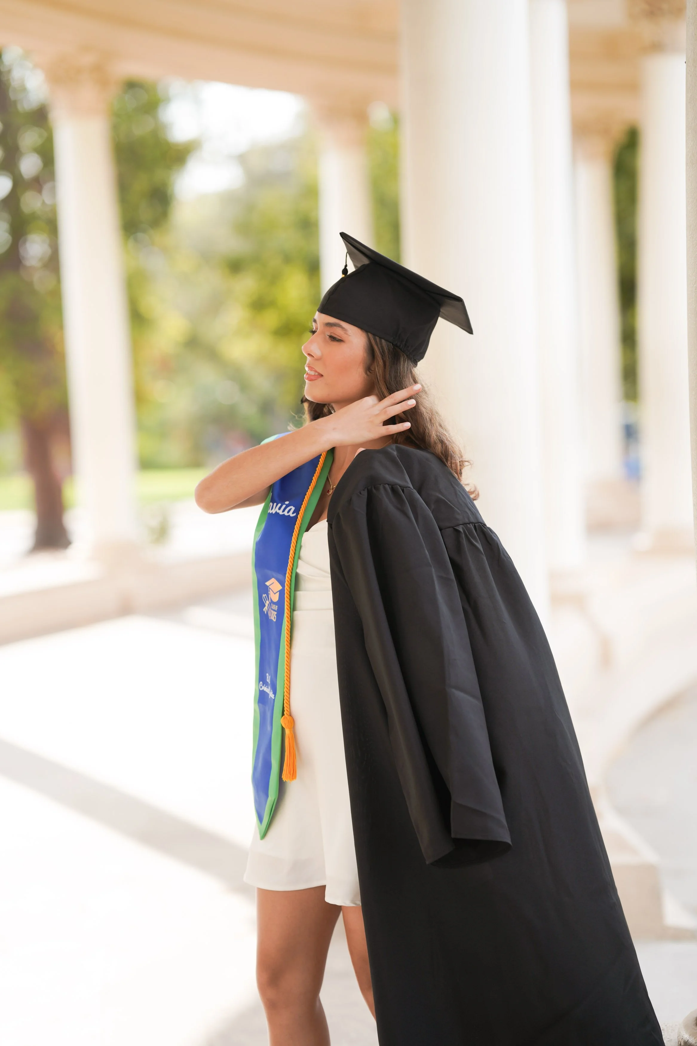 From UWF to San Diego, this graduate celebrated their achievement with cap and gown portraits at Balboa Park.