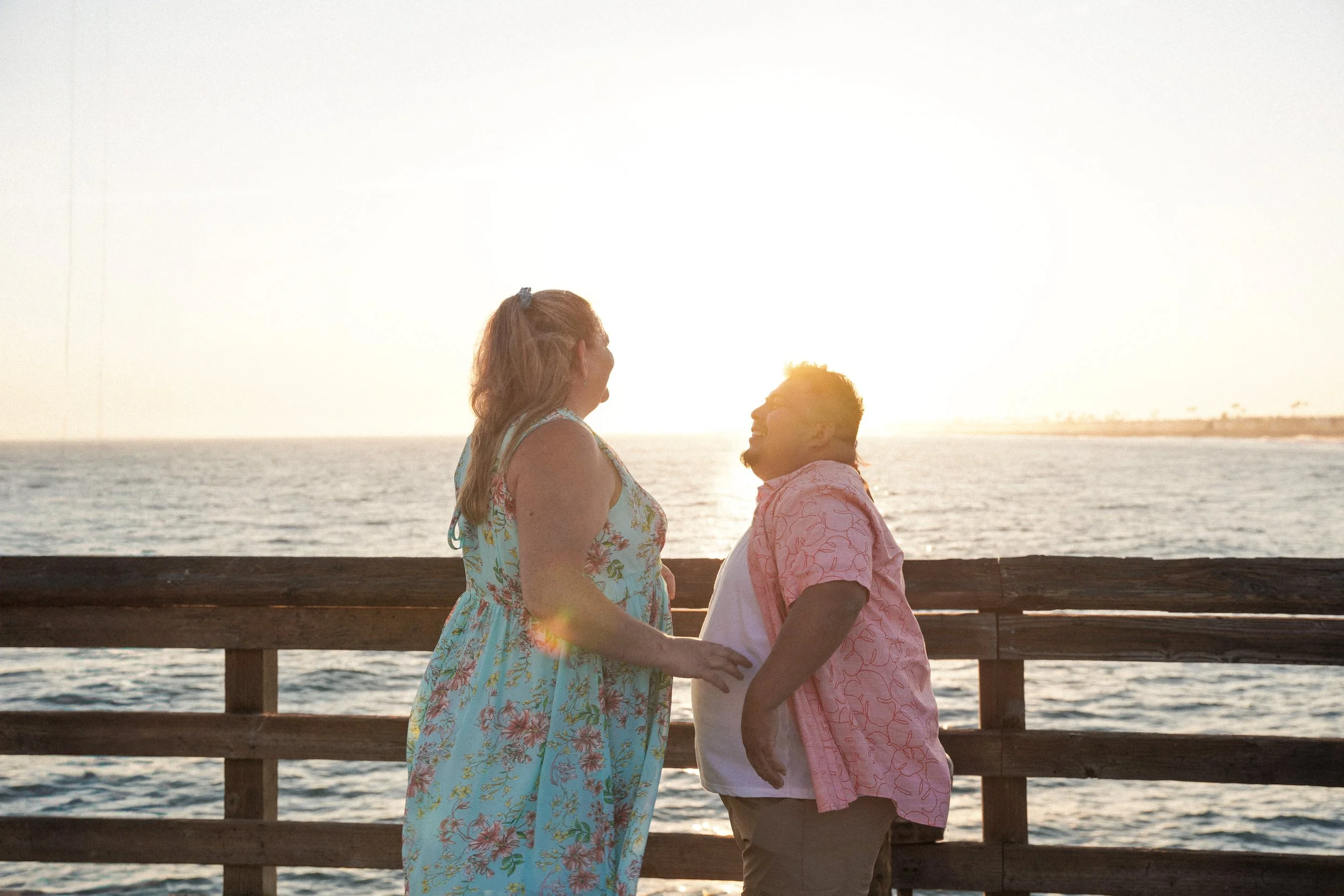 Balboa Beach Newport couple’s surprise engagement, photographed with undercover proposal package in Orange County.