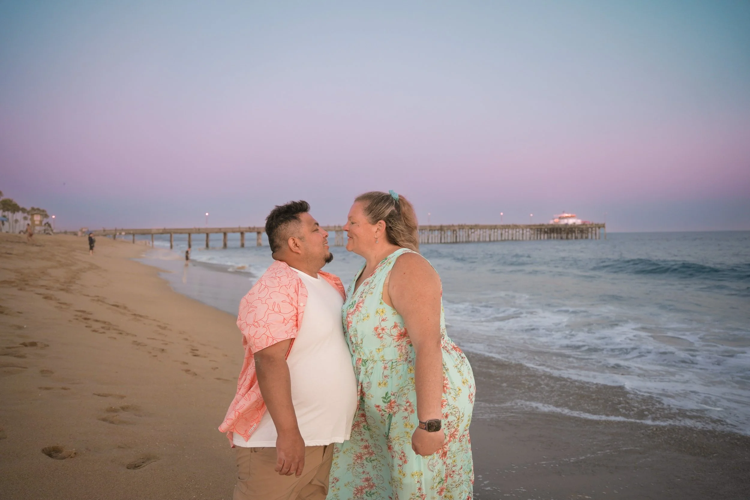 Balboa Beach Orange County engagement shoot, surprise proposal captured with our Newport undercover photography package.