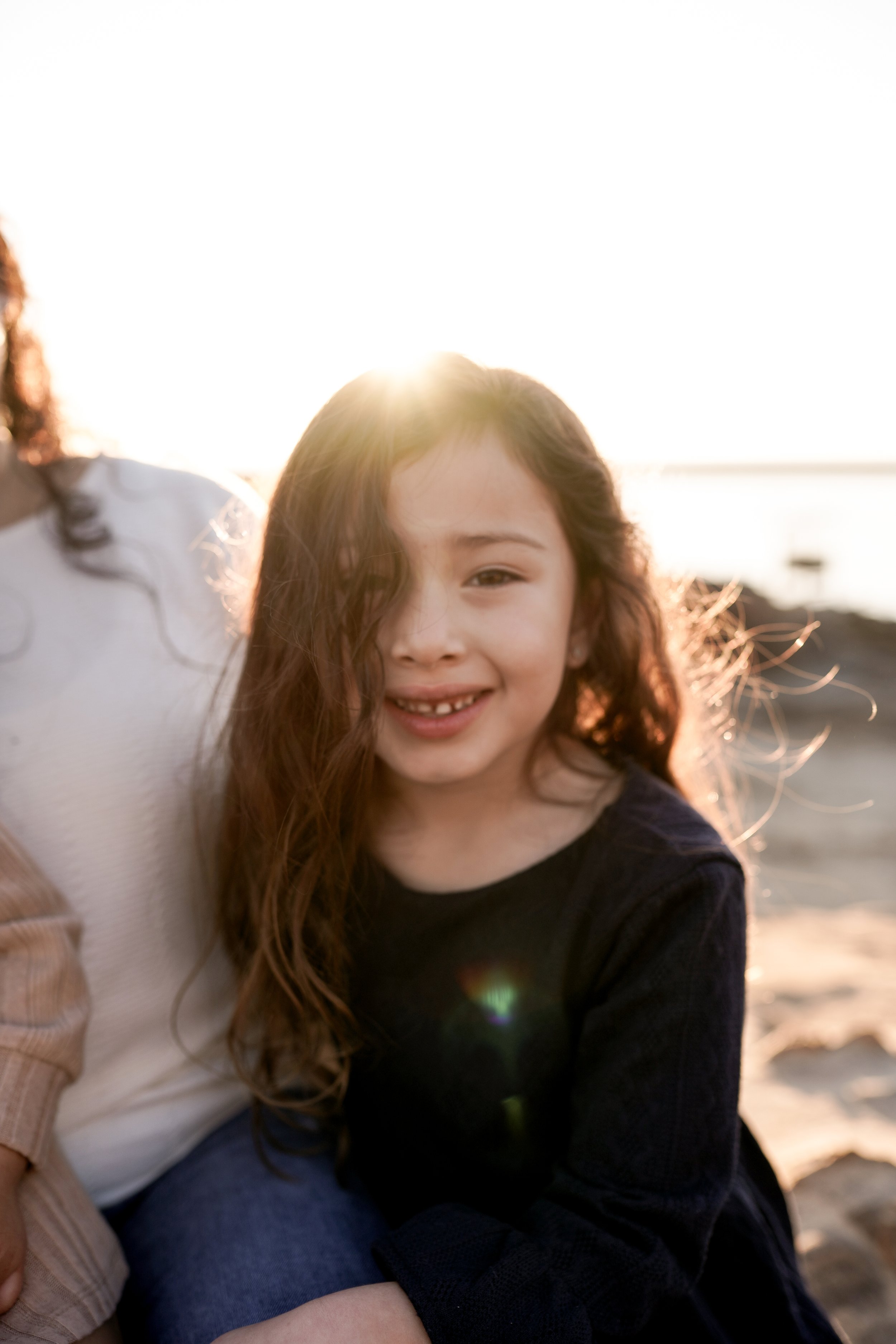 Family and children’s photography at Corona Del Mar during golden hour—capturing warm light, genuine smiles, and heartfelt moments by the sea. Timeless portraits full of love and laughter.