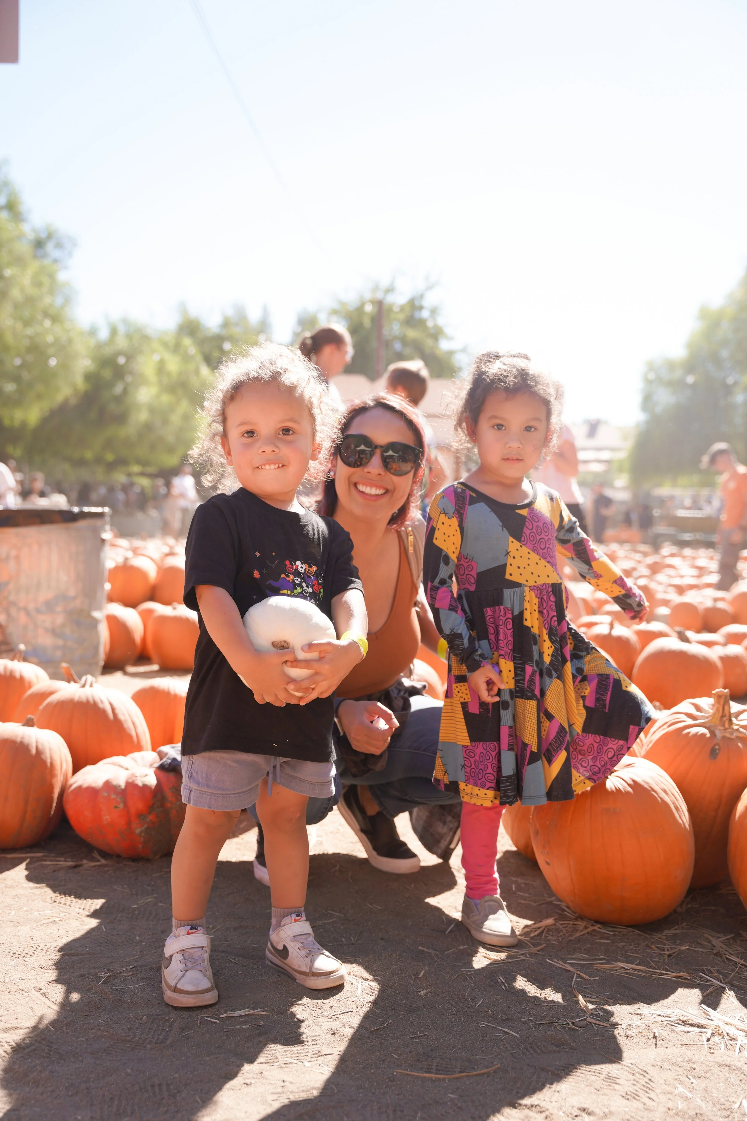 Seasonal couples photography at Temecula pumpkin patches. Limited mini sessions, offered once a year. Reserve now.