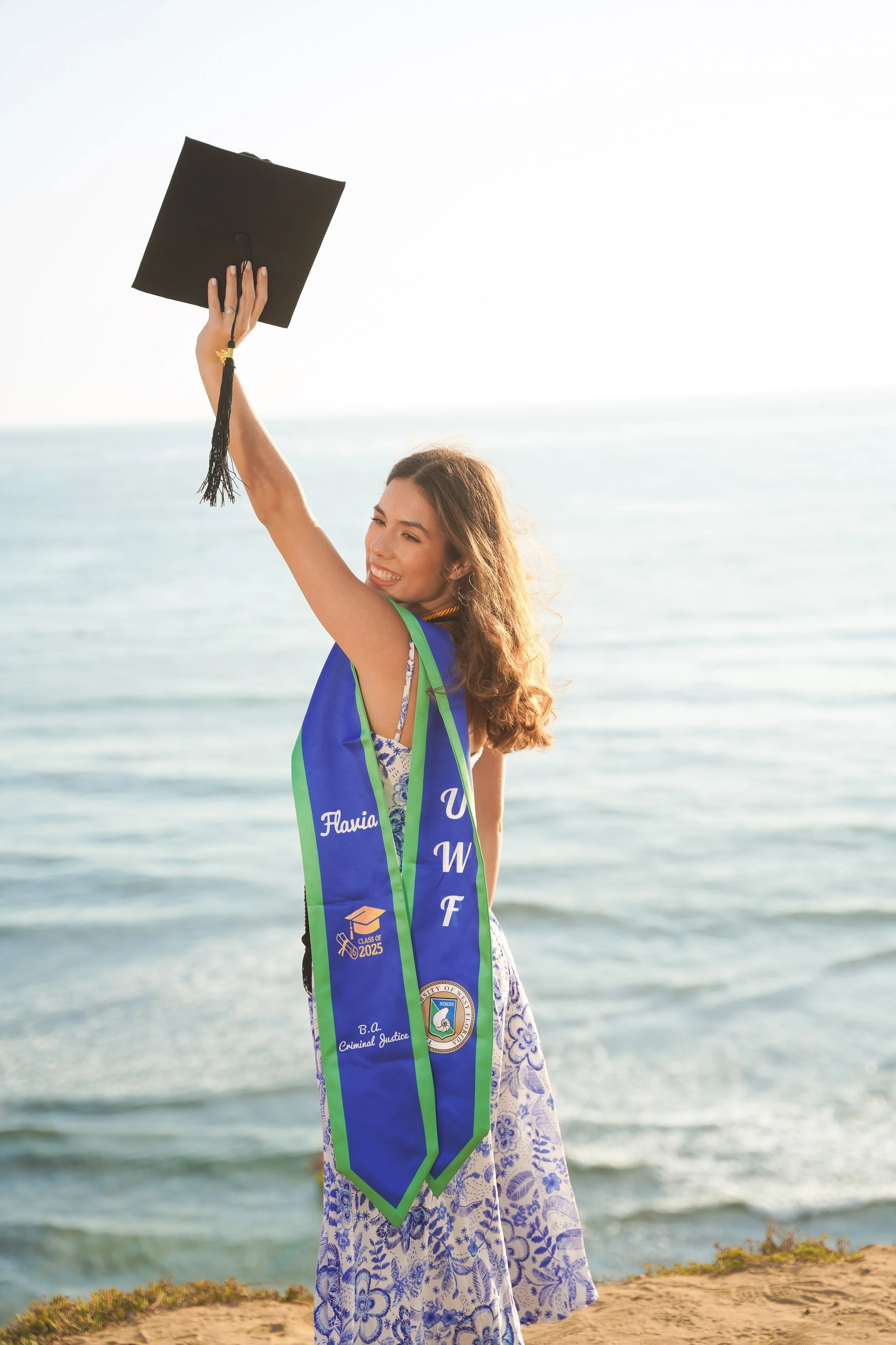 Sunset Cliffs graduation portraits at golden hour, where San Diego’s cliffs and ocean horizon set the stage for milestone photography that feels cinematic.