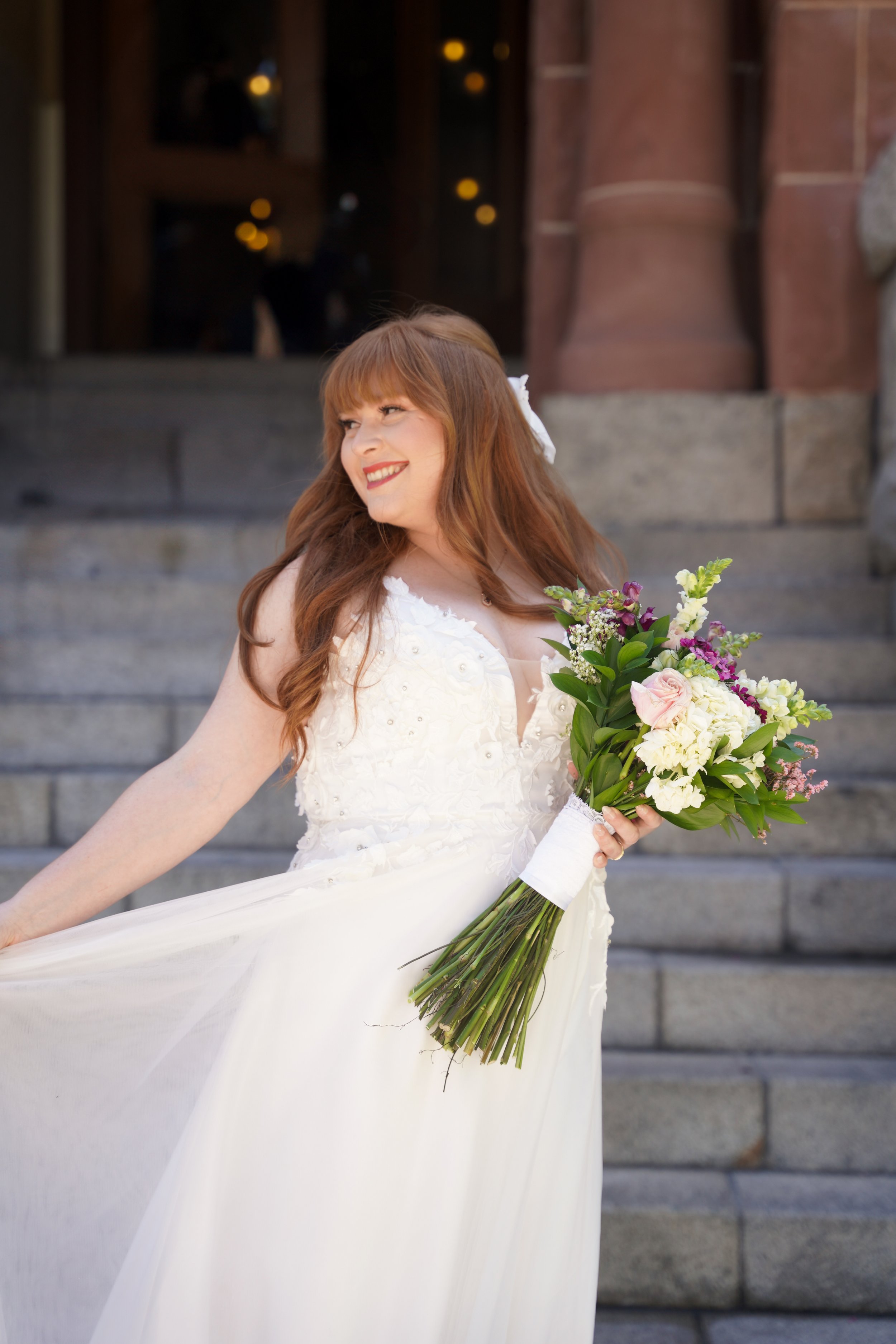 Beautiful, timeless moments captured of Joshua & Colleen at the historic OC Courthouse in Santa Ana. Civil courthouse wedding photography that tells your story—book us today.