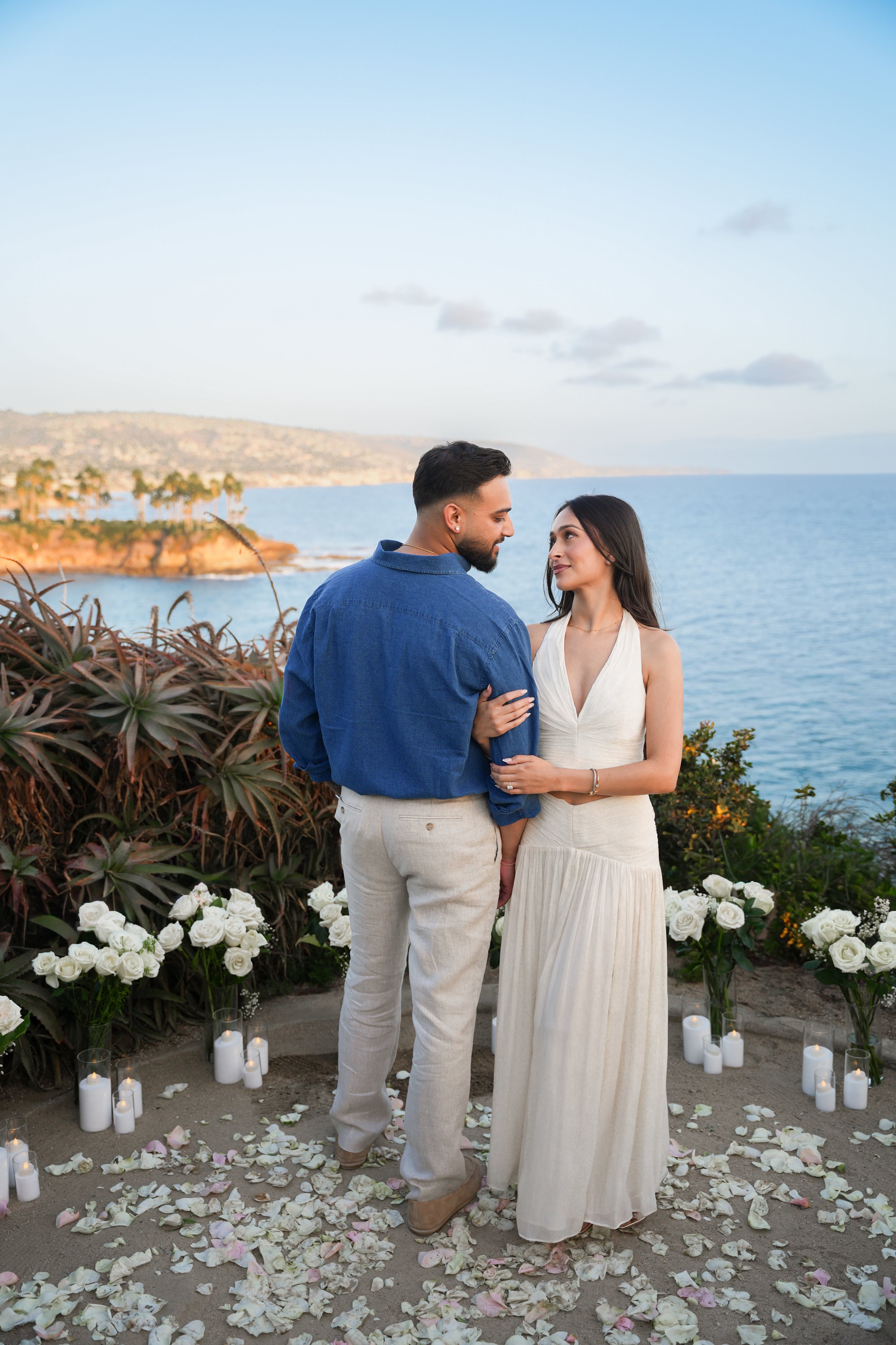 1. Surprise proposal inside a floral half-circle photographed by Last Minute Photoshoot.
