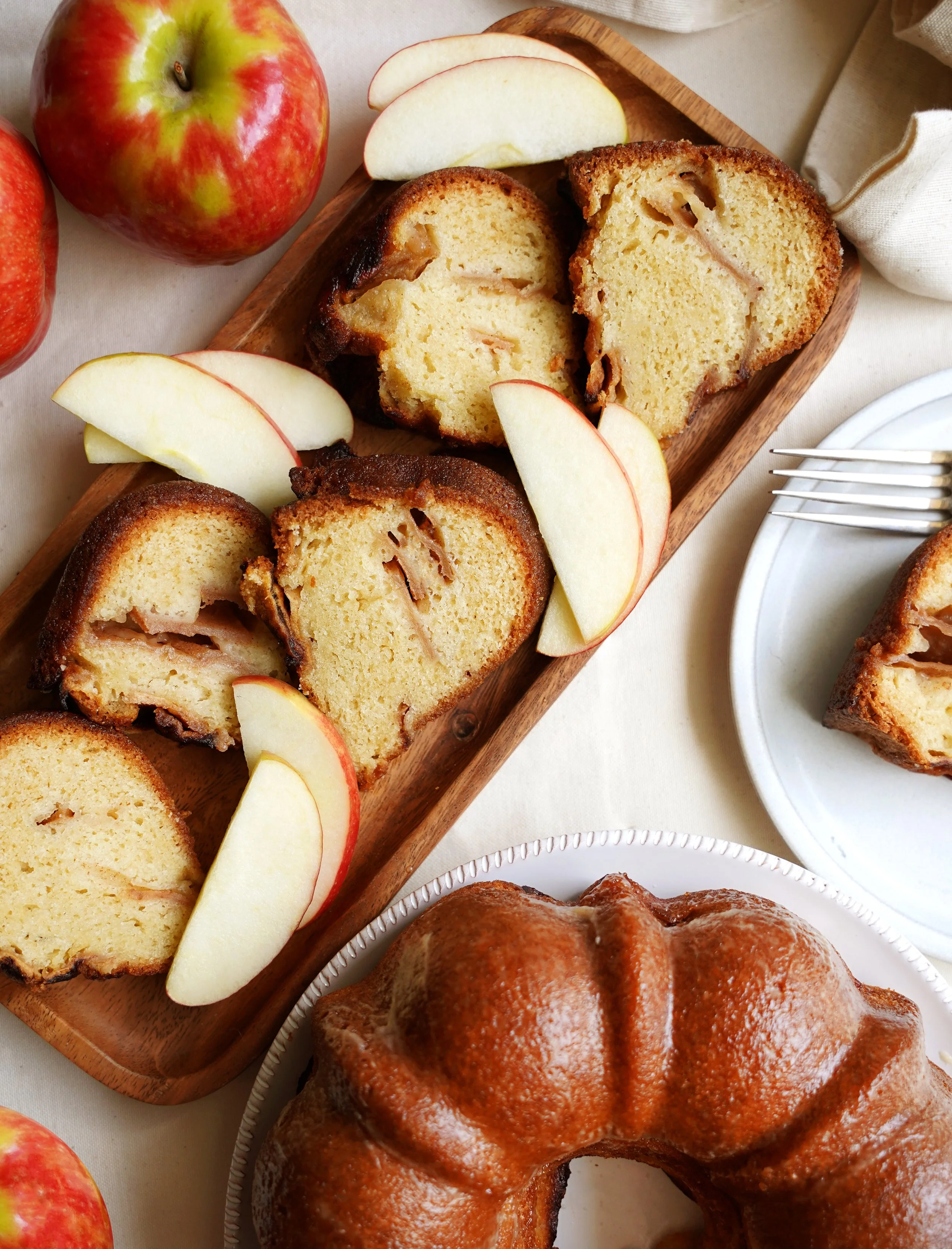 Apples and sliced pieces of Apple Honey Cake