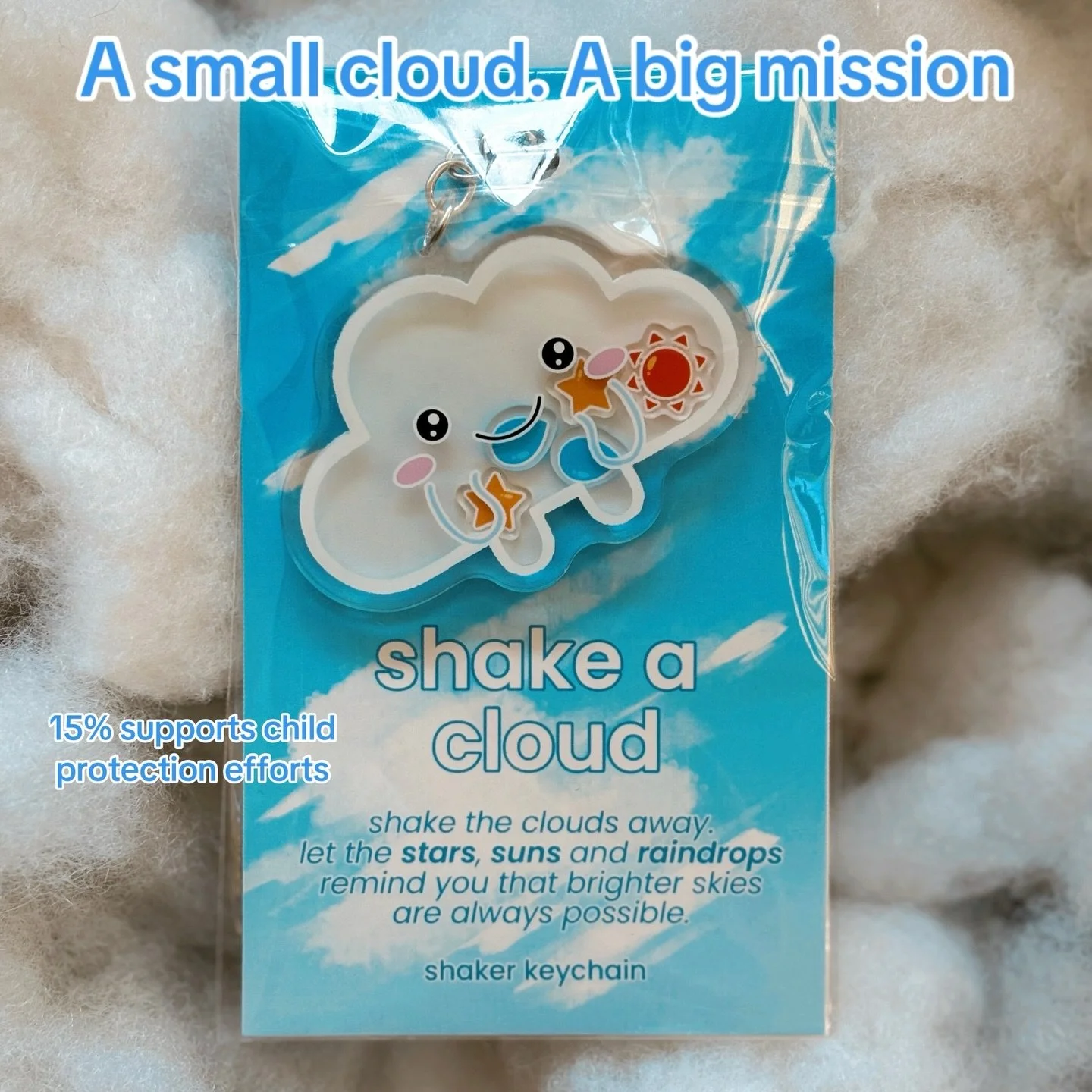 A small cloud. A big mission ☁️✨

Every Shake a Cloud Keychain holds floating suns, stars, and raindrops &mdash; a little reminder that brighter skies are always possible. Clip it to your keys, backpack, or purse, and take hope with you everywhere.

