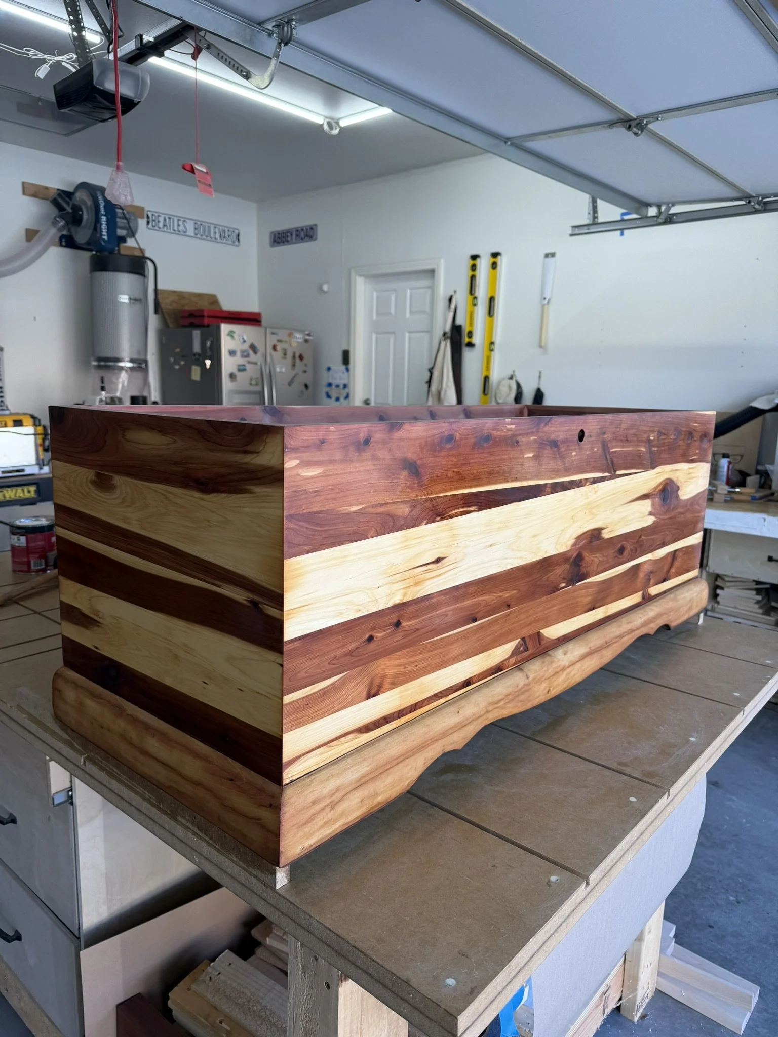 Dry Wood Popping with Conditioner - 

Conditioning in progress.  You can see how the cedar is already taking it in.  Prepping soft woods like this ensures the final stain won’t soak unevenly or leave blotchy spots.