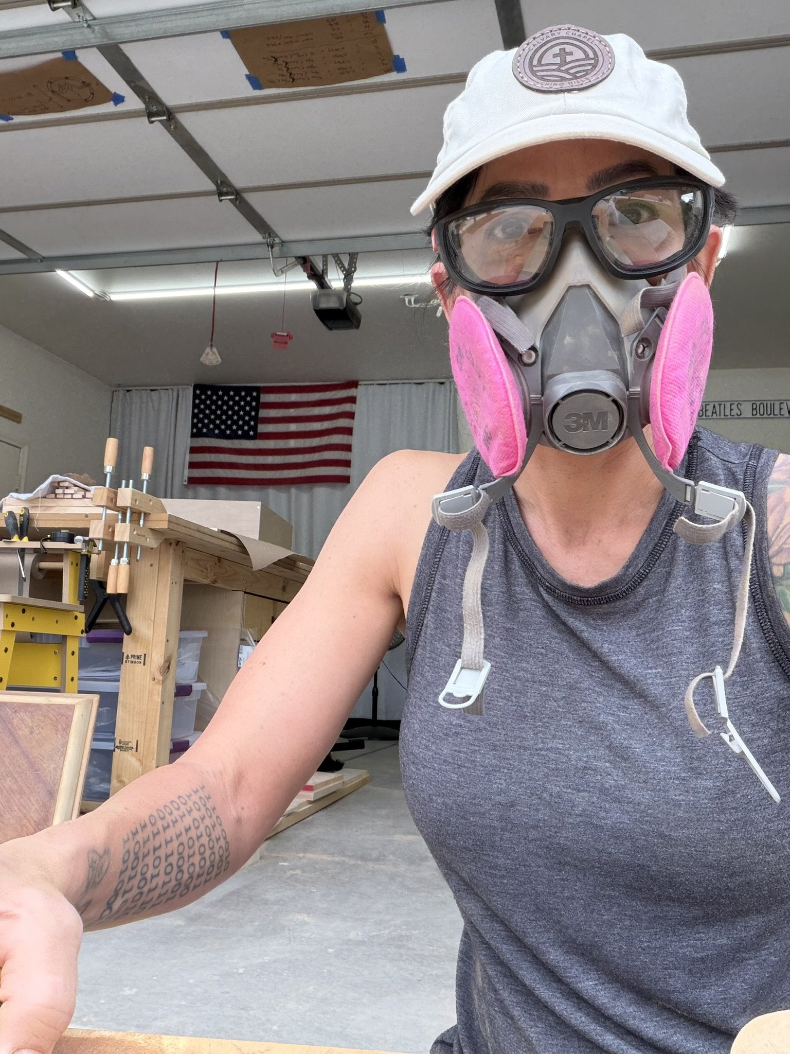 Sanding Marathon: The Veneer Battle - 

After failing to lift the veneer with heat, I surrendered to the orbital sander and a LOT of hand sanding, settling in for the long haul.  13 hours to be exact.  I worked out in the driveway, collecting smiles 