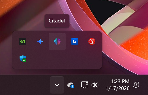 Screenshot of a Windows computer taskbar showing several application icons, system notifications, time, date, and a focus assist toggle.