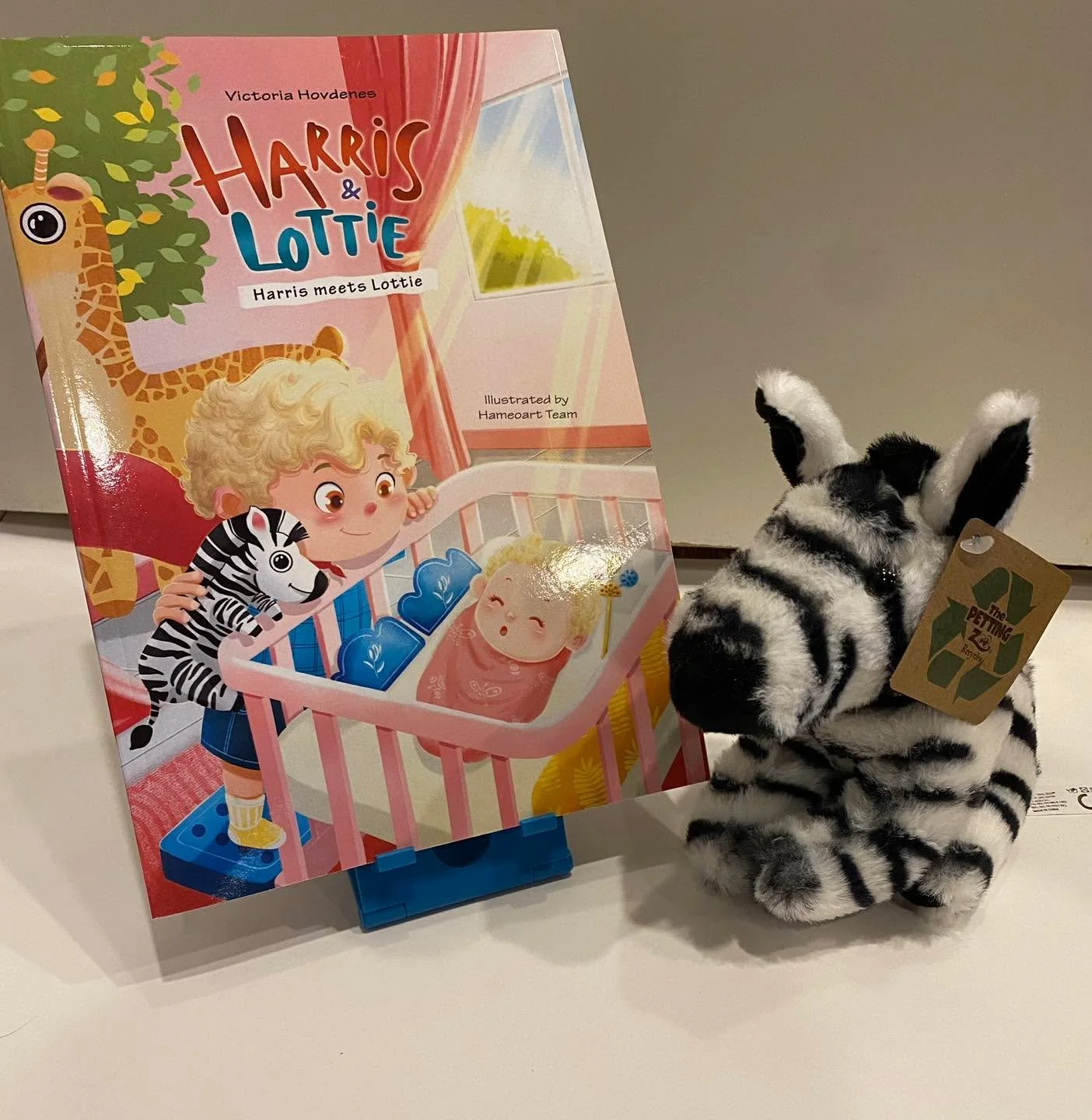 When Harrison met his baby sister, we were both so excited. 🥰
I&rsquo;d seen how a tiny gift &ldquo;to the new baby&rdquo; helps big siblings feel connected, so in Harris Meets Lottie I wrote that moment in&mdash;Harrison brings Lottie a little zebr