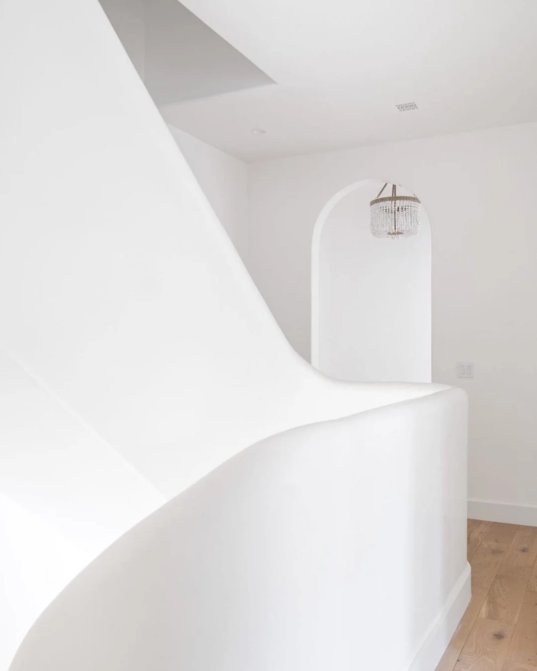 Every curve tells a story in Alys Beach. This staircase isn&rsquo;t just a transition between floors... it&rsquo;s designed to flow seamlessly with the home&rsquo;s architecture.

#chanceyarchitecture #chanceyinteriordesign #staircase #staircasedesig