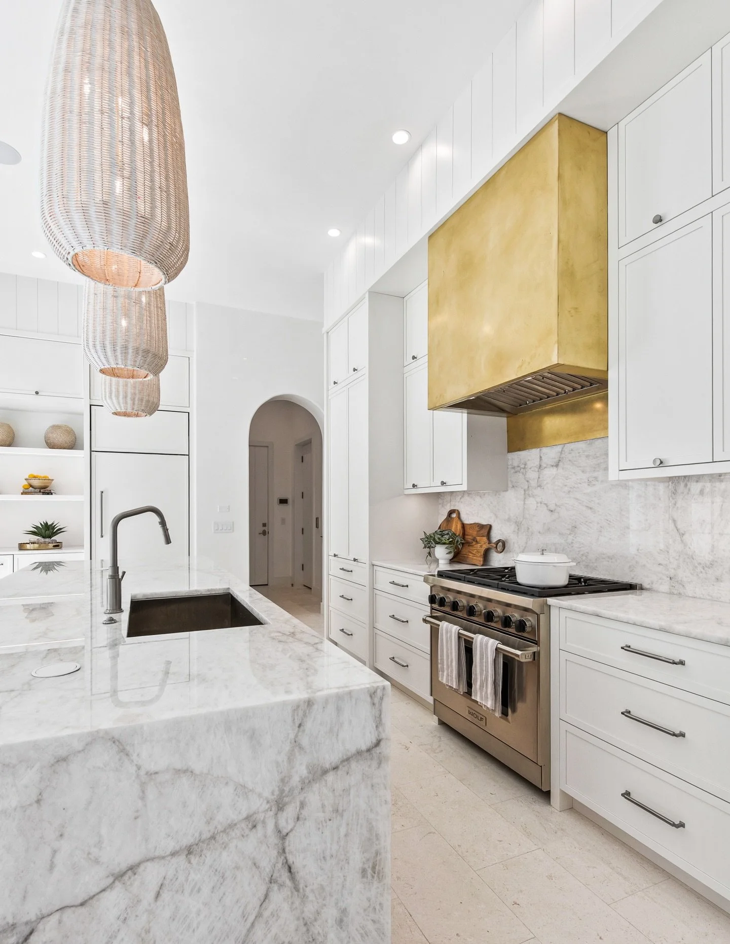 An open, functional kitchen designed to connect seamlessly to the outdoors. With doors opening to the courtyard pool, the space invites effortless weekend entertaining and easy gathering. 

Thoughtfully designed for the moments that bring everyone to