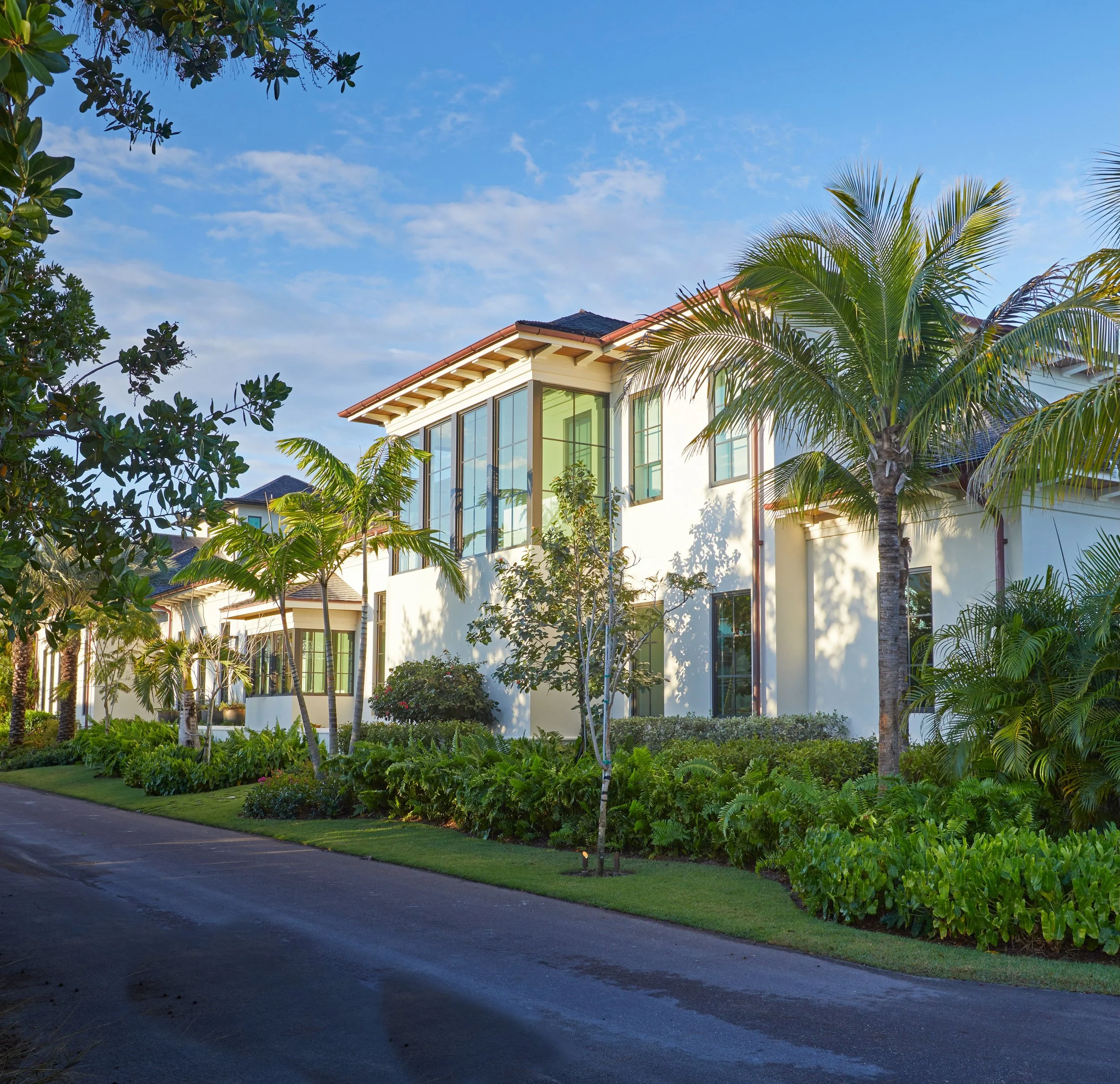 The heart of this Bahamas residence lives outdoors. 🌴 An open courtyard, water features, a fire pit, summer kitchen, and cabana create the perfect setting for gathering, relaxing, and enjoying every season. 

Photography: @jallsopp 

#residentialarc