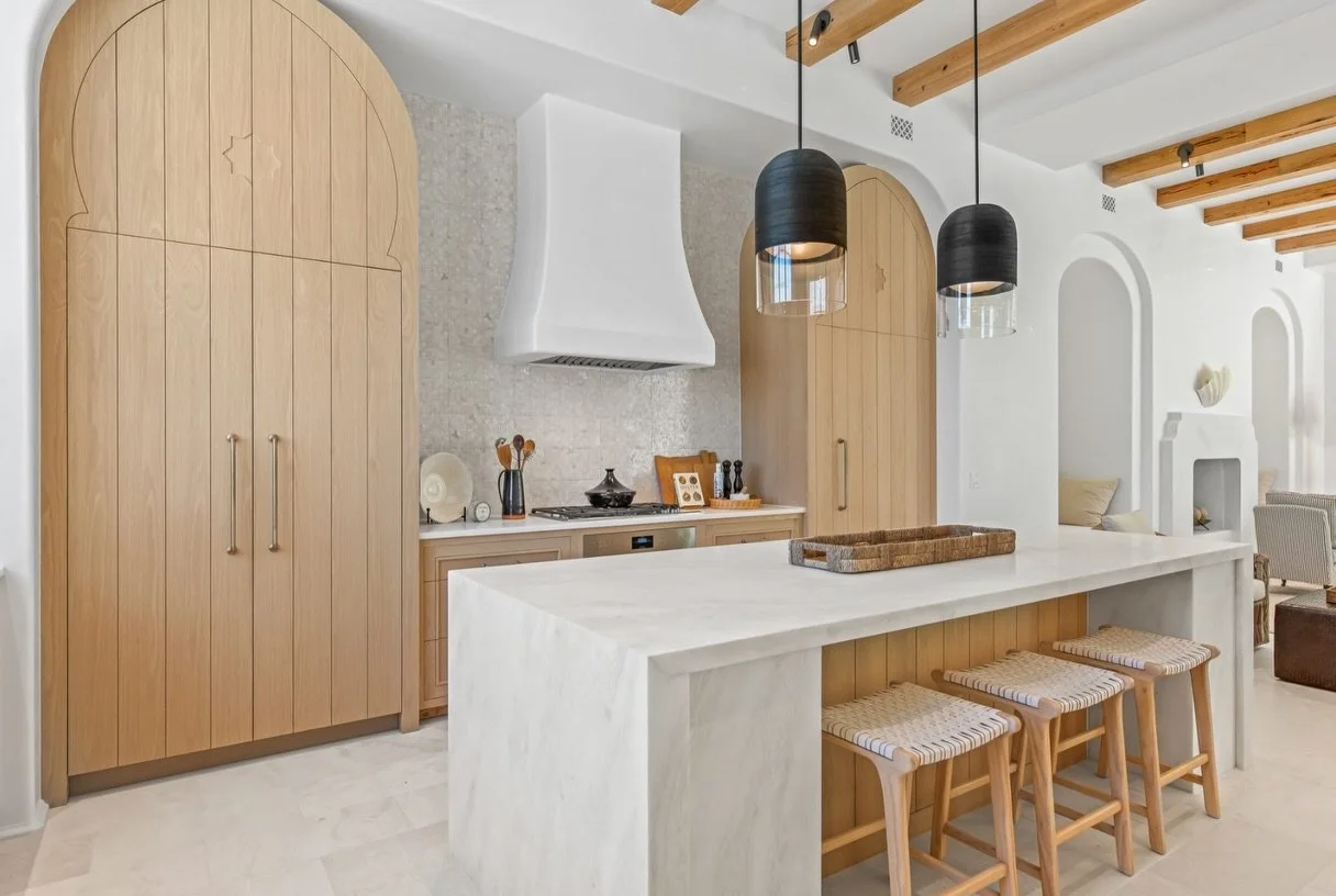 The heart of the home, made for gathering. An expansive island gives everyone a place to land, while the open layout keeps the conversation going. Thoughtful architectural details bring character to the space, making it just as enjoyable to cook in a
