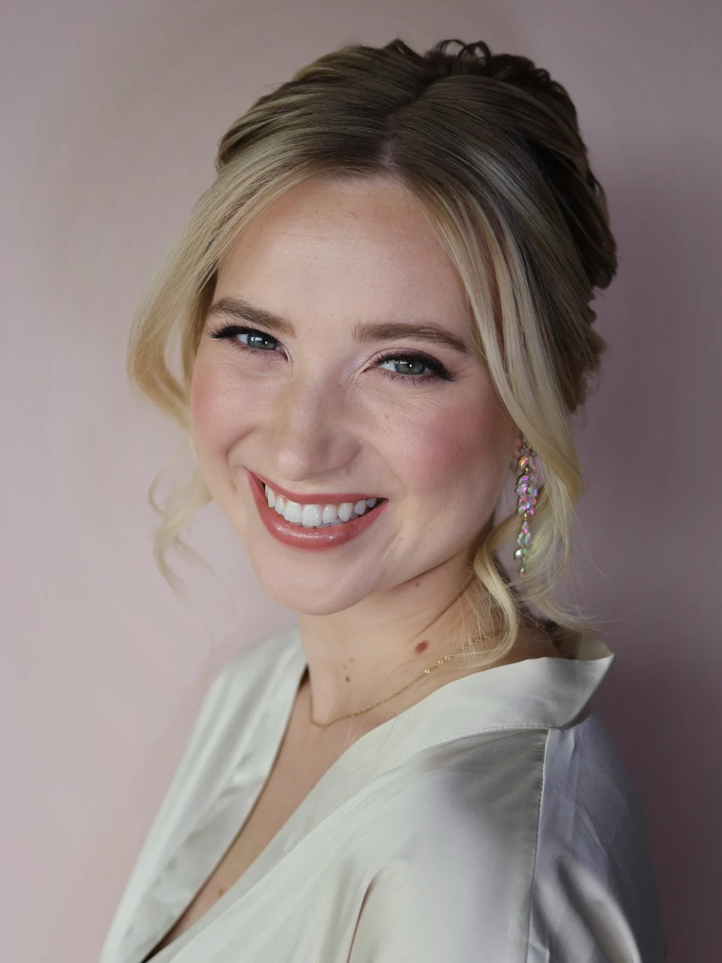 You don&rsquo;t necessarily need to wear more makeup, you just need intentionally applied makeup. 

Bridal makeup that enhances your features, accentuates your unique beauty and showcases the best of you, is going to make you feel the most like you, 