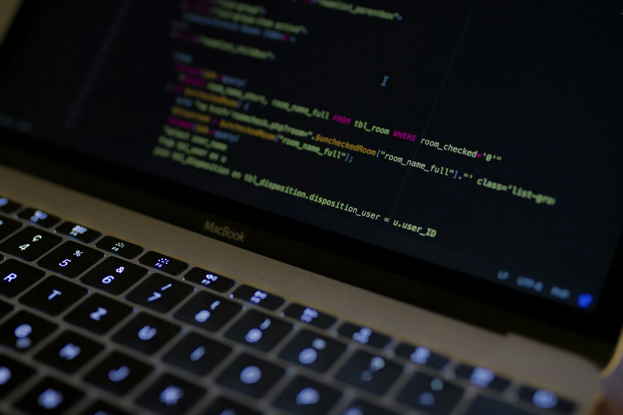 html code for a church website on a laptop