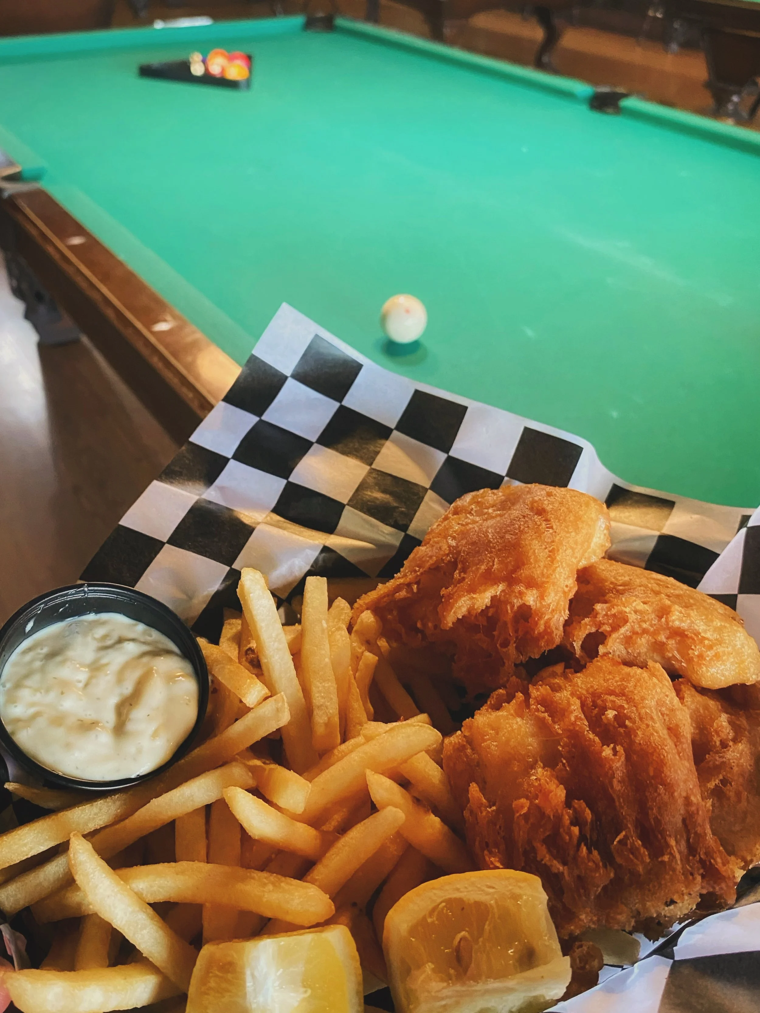 🐟🎱 Dinner and a game plan.

Our fish &amp; chips are crispy, golden, and ready to be admired from across the pool table while you pretend you&rsquo;re definitely making that corner shot.

Grab a basket, rack &rsquo;em up, and make an evening of it 