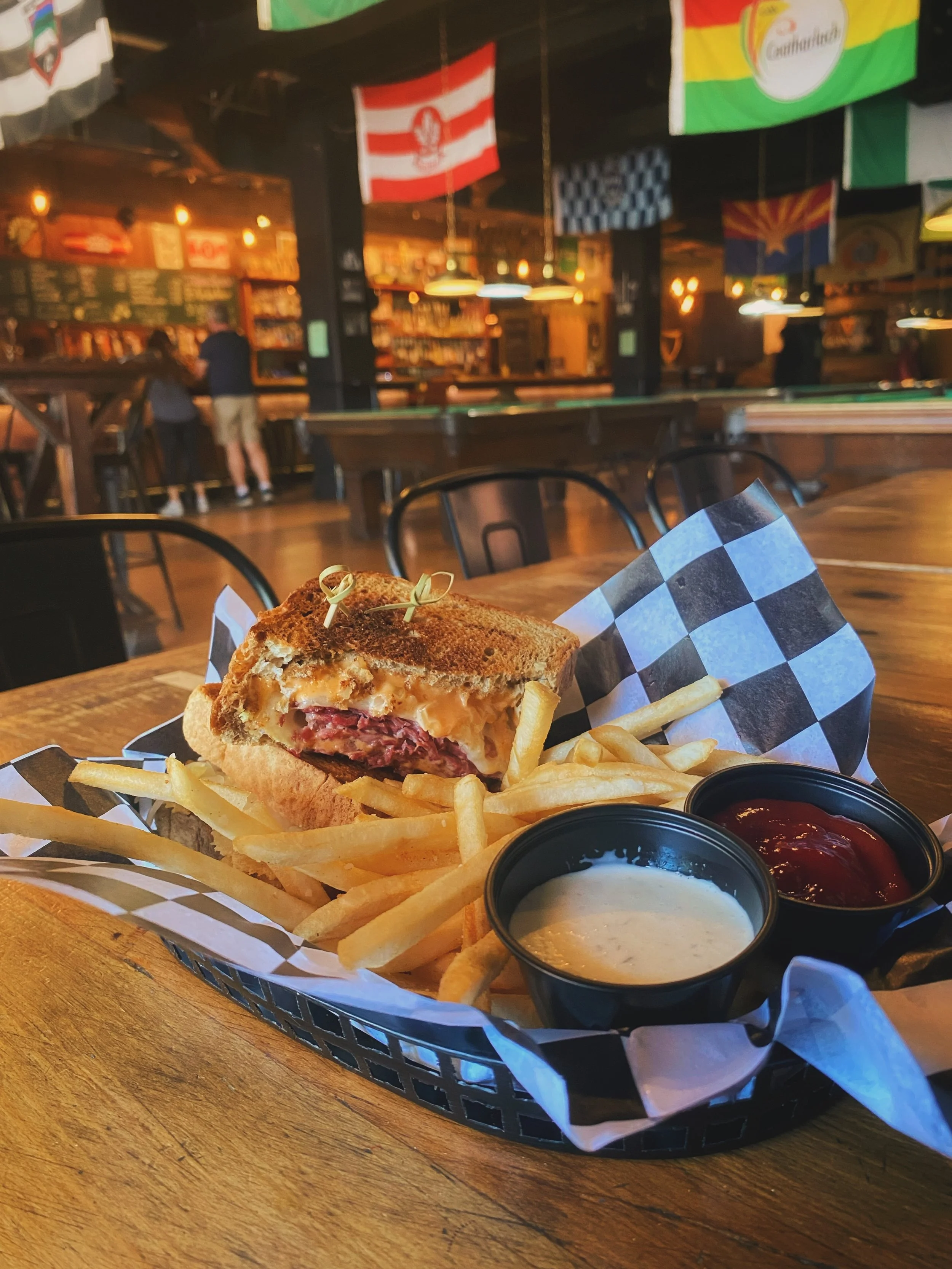 🥪 Have you tried our Famous Corned Beef Reuben yet?

House-made corned beef served on marble rye, topped with sauerkraut, thousand island dressing, and Swiss cheese.

It&rsquo;s stacked, savory, messy in the best way, and exactly the kind of Pubhous