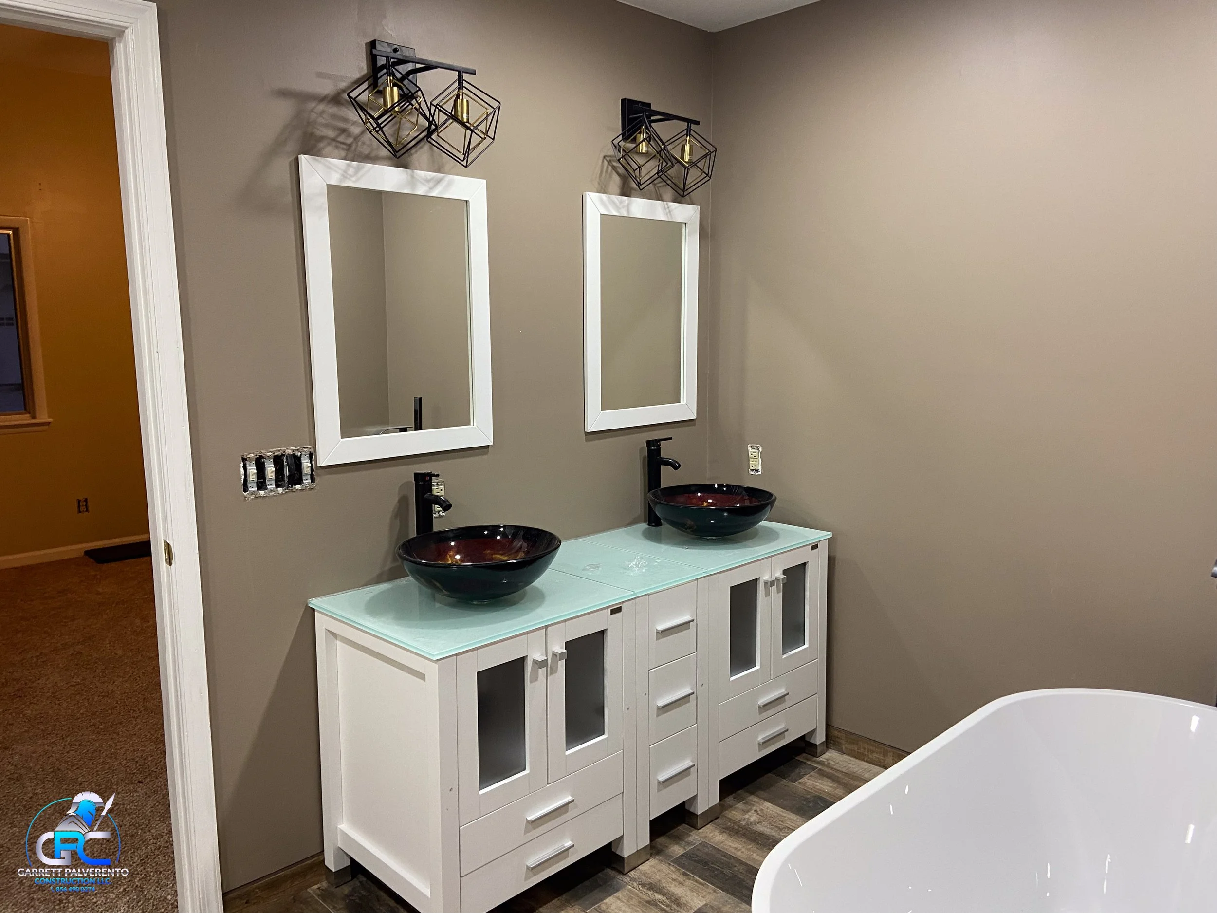 high end bathroom remodel with double sink and tile floor
