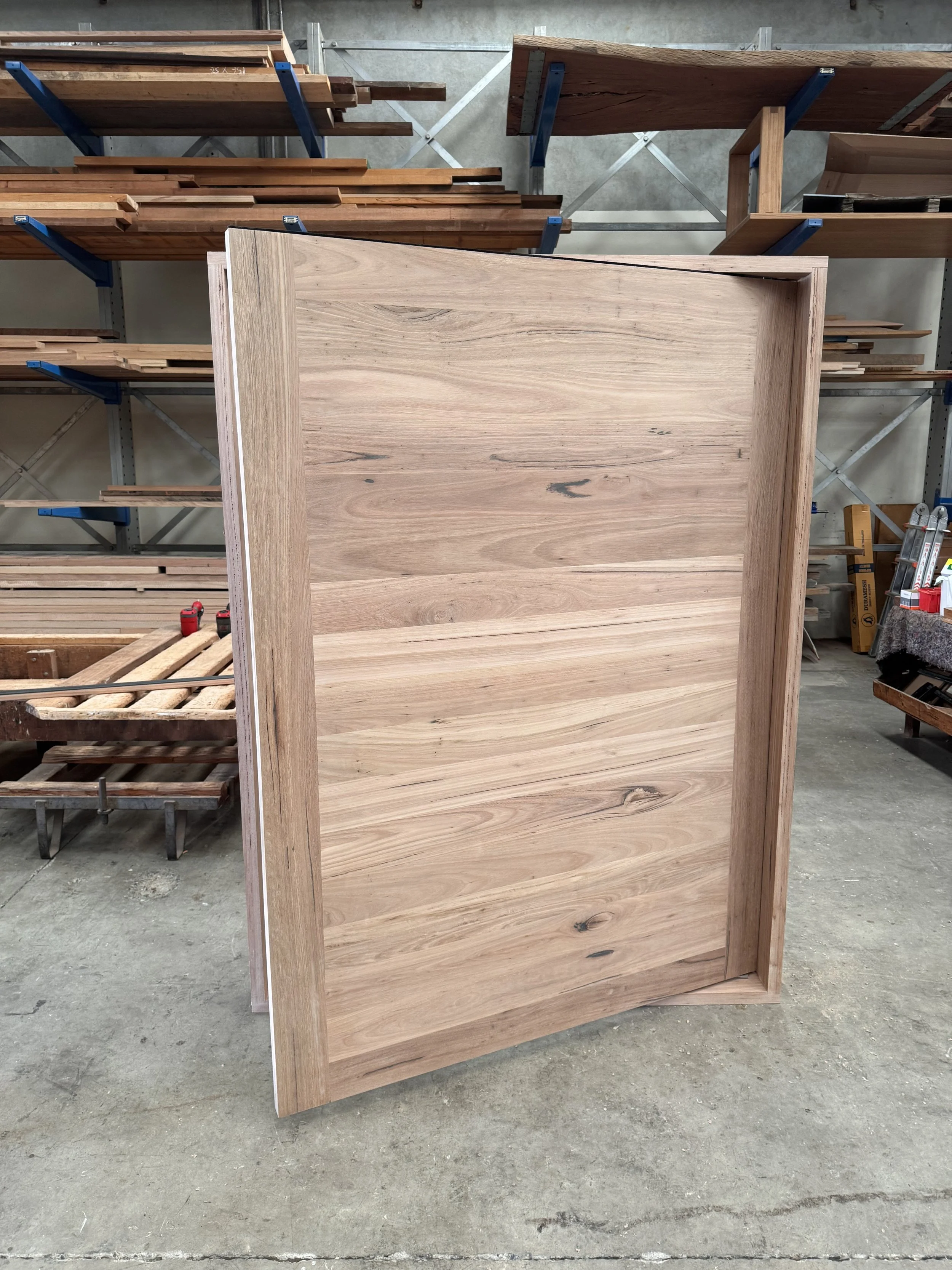 Tasmanian Oak Pivot door.