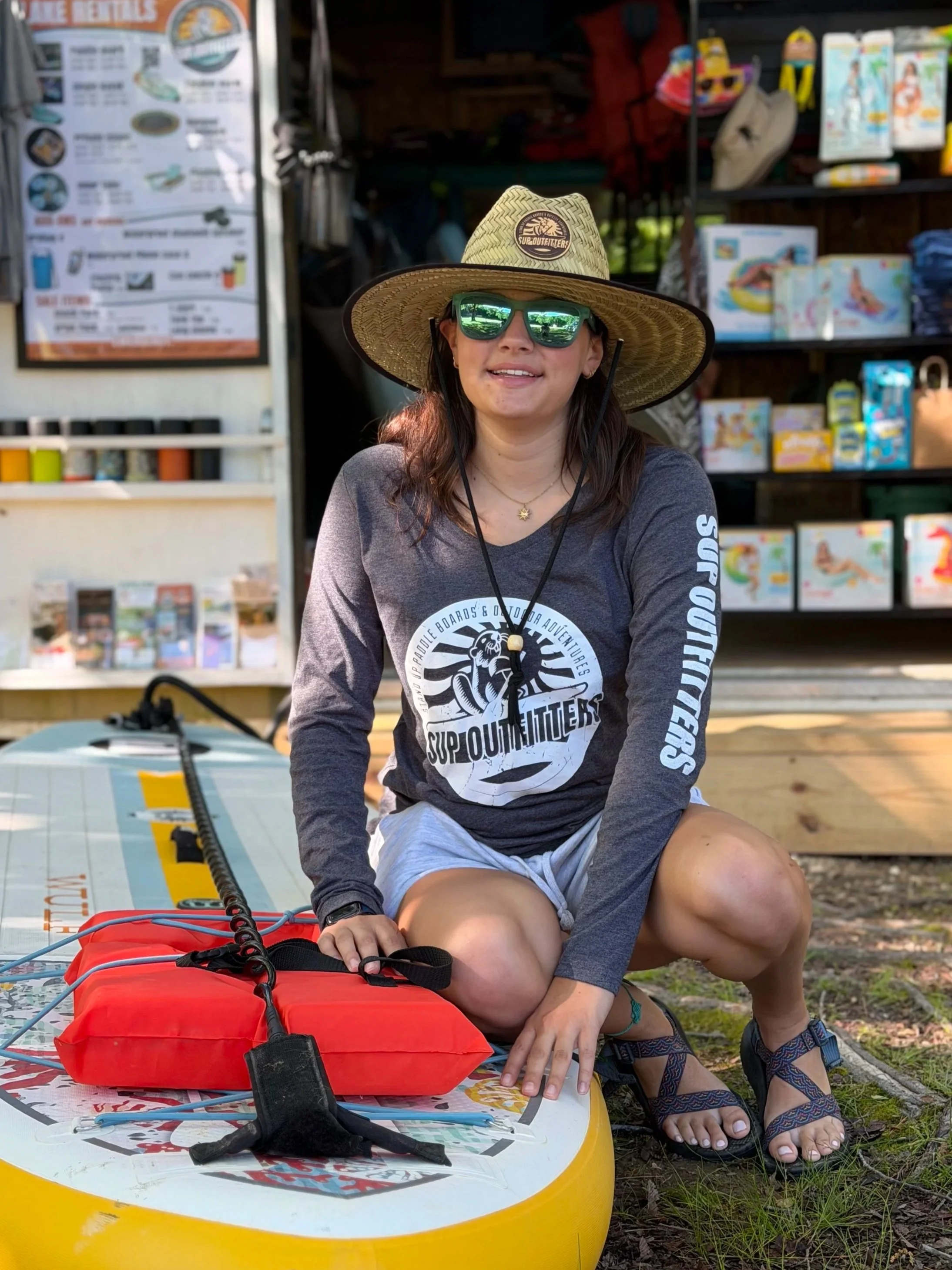 Woman enjoying the lakefront at Beaver Lake in Eureka Springs, Arkansas, near SUP Outfitters.