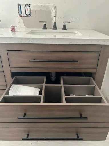 Bathroom vanity with drawers open