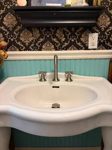 Pedestal sink and faucet