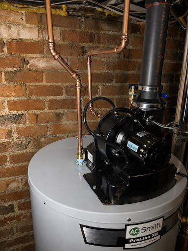 Water heater vent assembly