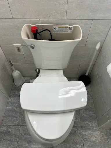 Toilet with tank open