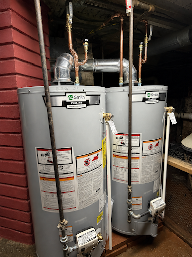 Two water heaters and connected piping
