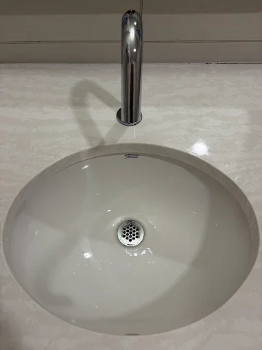 Round sink and faucet