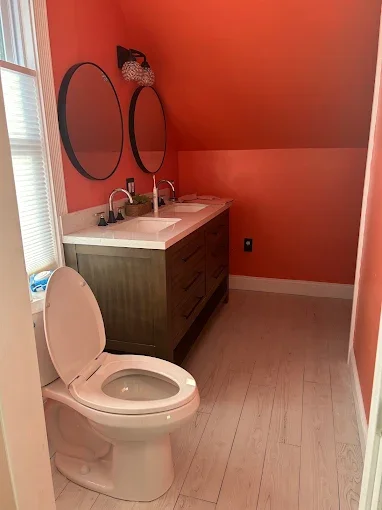 Bathroom vanity and toilet