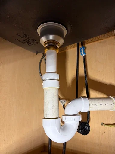 Sink drain and trap