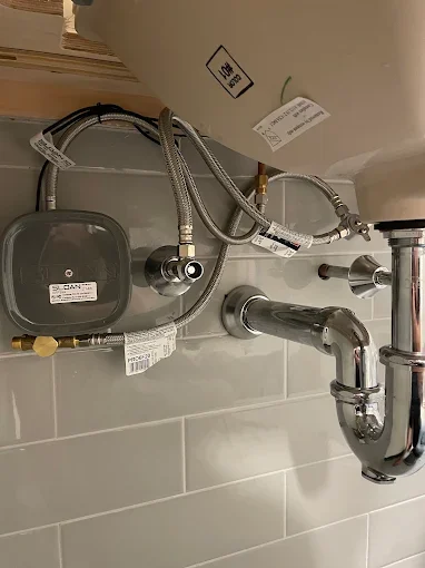 Under-sink plumbing connections