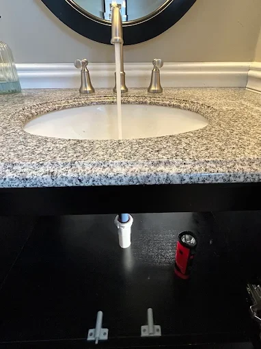 Bathroom sink and cabinet plumbing
