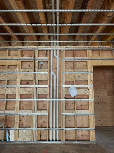 Open-wall plumbing rough-in