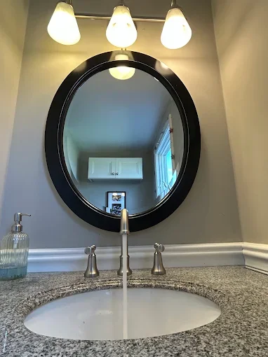 Bathroom vanity and faucet