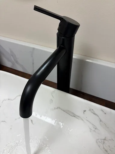 Dark bathroom faucet