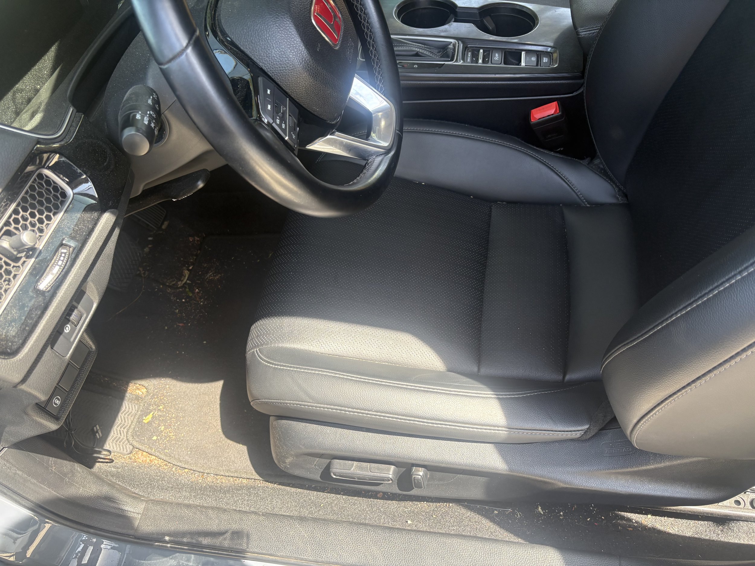 Steering wheel, dashboard, & seats/floor matts completely cleaned