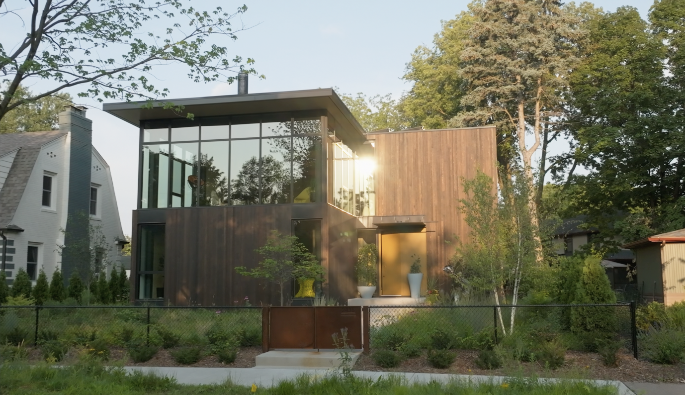 Commercial photo of the exterior of a large home with new smart windows from Marvin Windows.