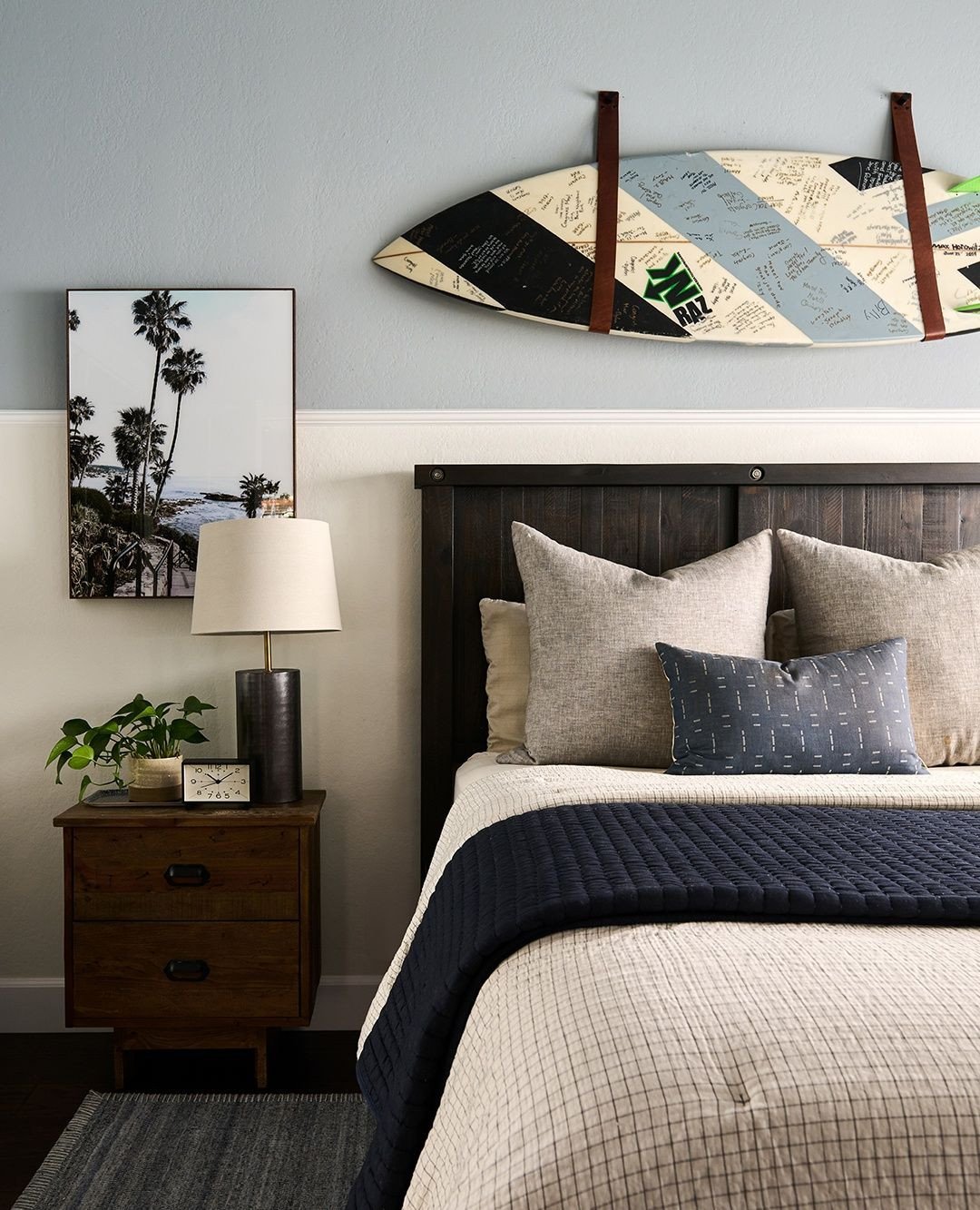 Wall decor should have personality and meaning- this teen&rsquo;s signed short board became the perfect centerpiece. For this bedroom designed with intention, it&rsquo;s these unexpected, creative touches that a fresh design perspective brings to lif