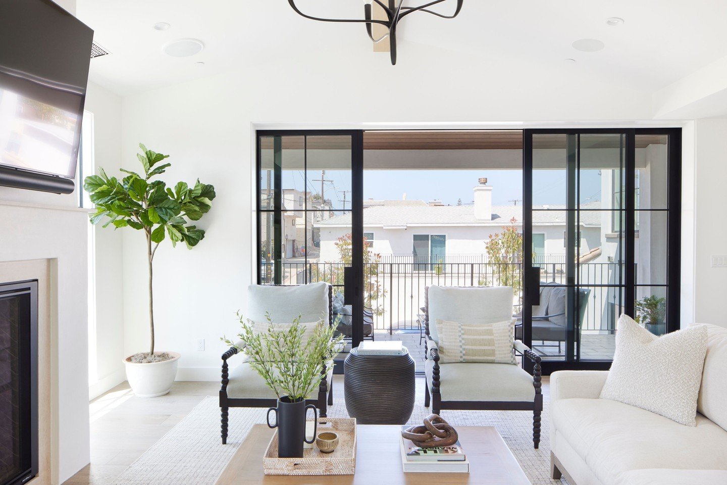 Why choose between two if you can have both? Blurring the line between outside and in, this room was designed to maximize natural light, smooth flow, and year-round relaxation. ⁠
⁠
#jharkavyinteriors #livingroom #livingroomdesign #livingspace #coasta