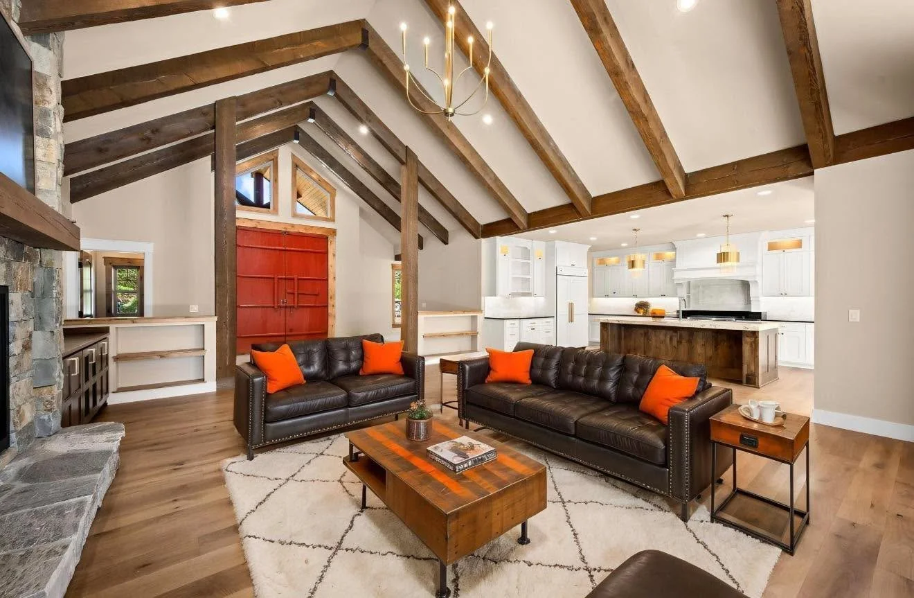 Timeless character meets modern comfort. 🤎
From the exposed timber beams and stone fireplace to the warm wood flooring and thoughtfully designed kitchen, every detail of this space brings a little more character home.

#customhome #luxuryhomes #home