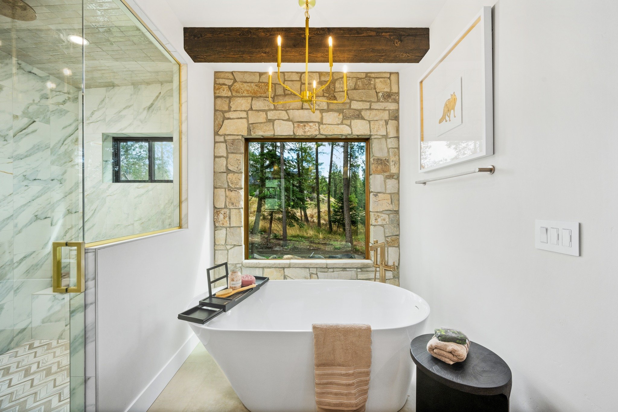 A bathroom designed to slow everything down. From the freestanding tub and marble shower to the stone surround and forest views beyond, every detail brings comfort and calm together in one beautiful space.

Ready to create a home that feels like your