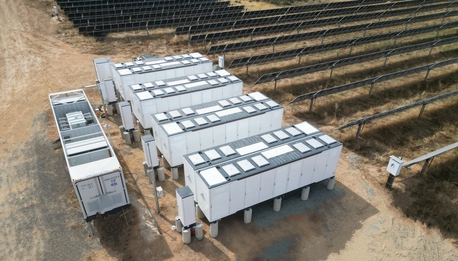 Aerial Image of CleanPeak Energy's Moama Solar Farm showing the battery energy storage system and inverter setup next to the solar panels