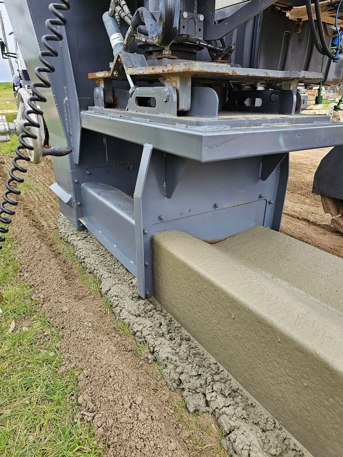 Slipform kerb and channel Geelong, Victoria. Kerb and channel melbourne. Civil construction company