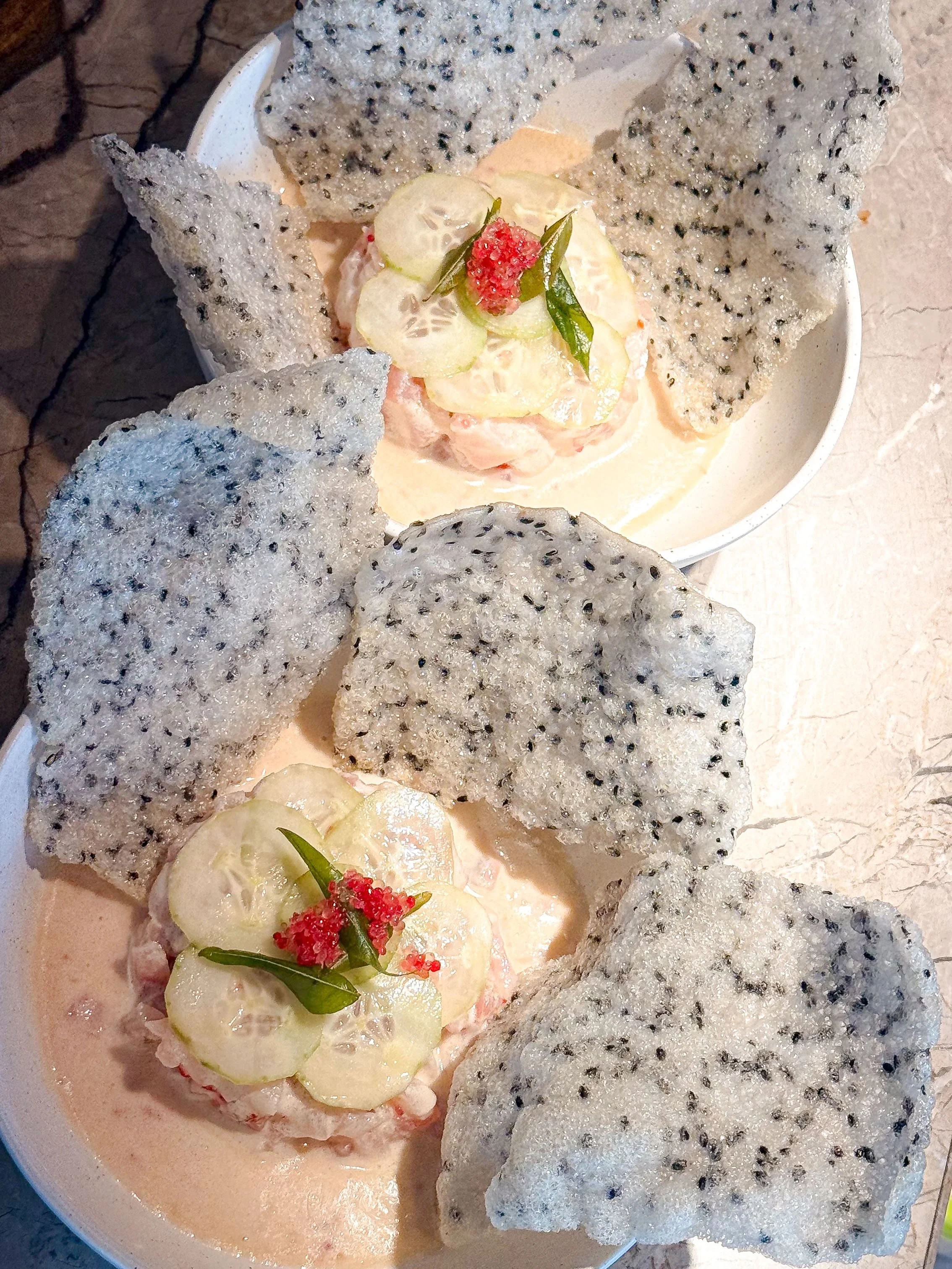 Signature ceviche that never disappoints. Crispy sesame crackers, fresh seafood and layered flavours at Eska Seafood Restaurant