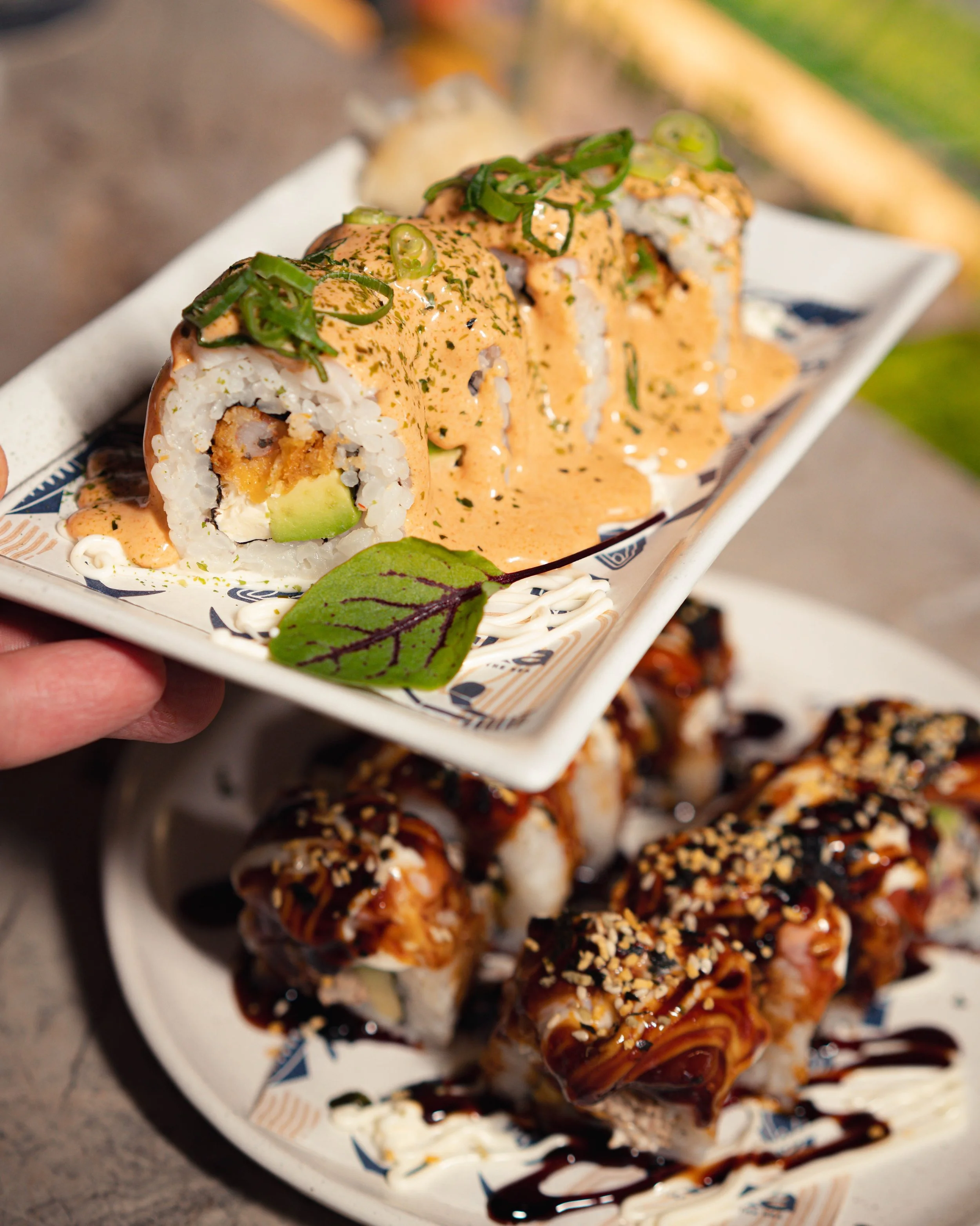Two favourites, one difficult decision. 🍣👀

ESKA ROLL &mdash; Aburi salmon, cooked tuna, avocado, teriyaki sauce &amp; mayo.

PRAWN DELUXE &mdash; Crumbed prawn, cream cheese, avocado, miso ponzu, mayo &amp; aonori.

You&rsquo;re only picking one. 